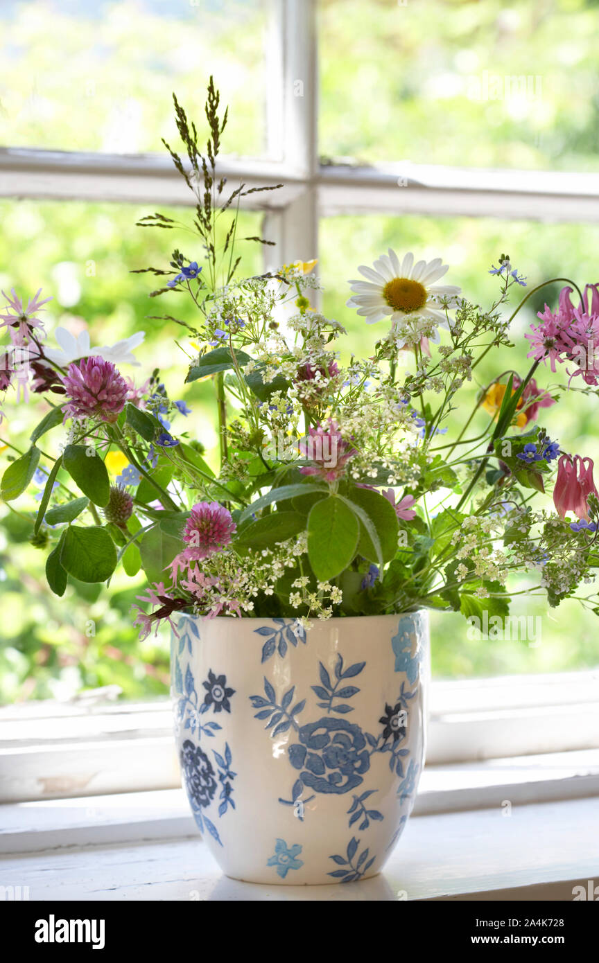 Bouquet in window Stock Photo