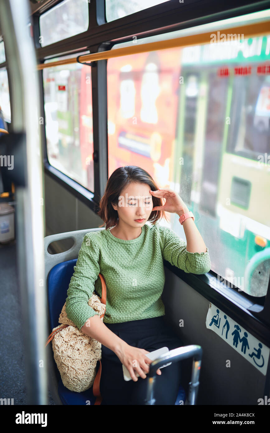Passenger traveling and feeling dizzy with headache in a bus travel Stock Photo Alamy