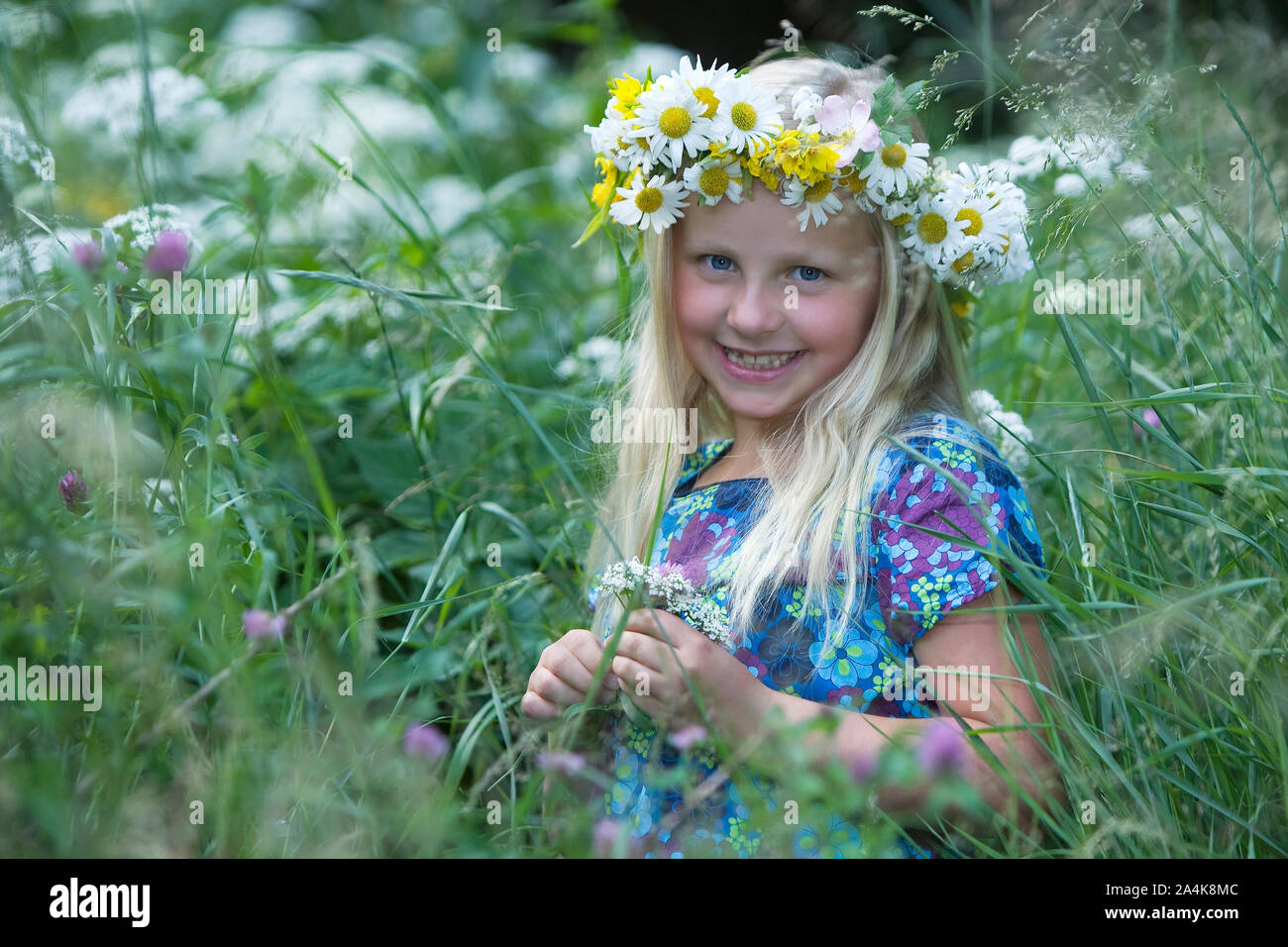 Portrait Of Young Girl Wearing Wreath Stock Photo