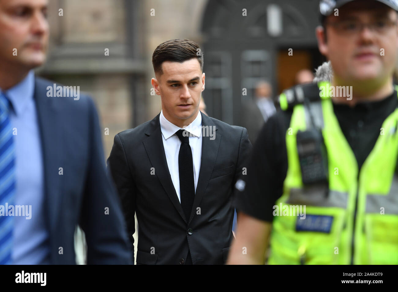 Derby County footballer Tom Lawrence leaves Derby Magistrates' Court where he and Mason Bennett have avoided prison after they admitted drink-driving over a crash which left their club captain seriously injured. Stock Photo