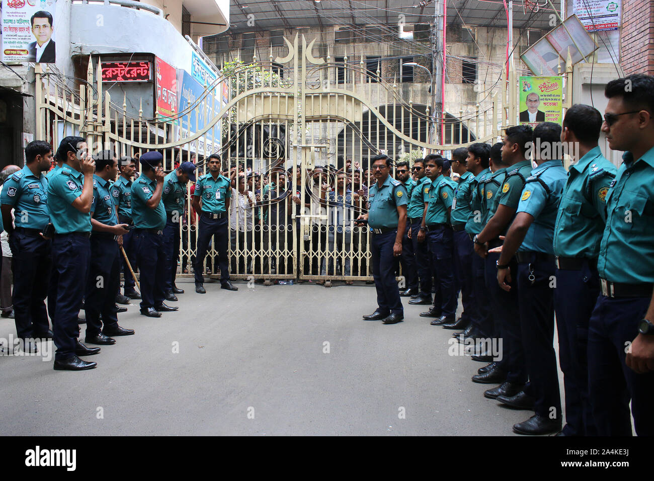 Policemen stand on guard during hearing of the group's leader Ismail Hossain Chowdhury Samrat Metropolitan Magistrate court in Dhaka.Former Jubo League leader Ismail Hossain Samrat, an alleged kingpin of the illegal casino business in the capital, was placed on 10-day remand in two cases filed under the arms and narcotics control acts. Stock Photo