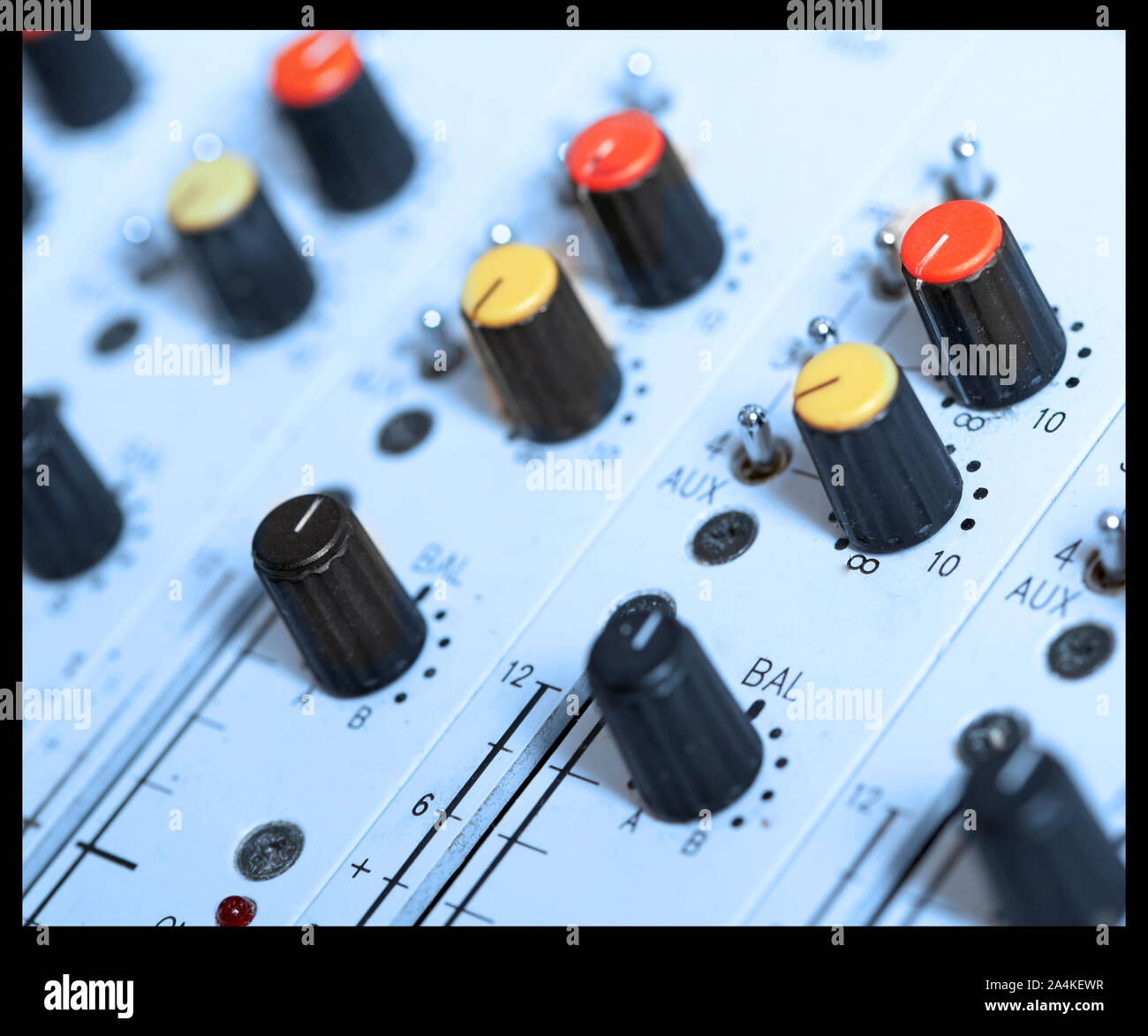 Mixing board in a recording/radio studio sound mixer volume on