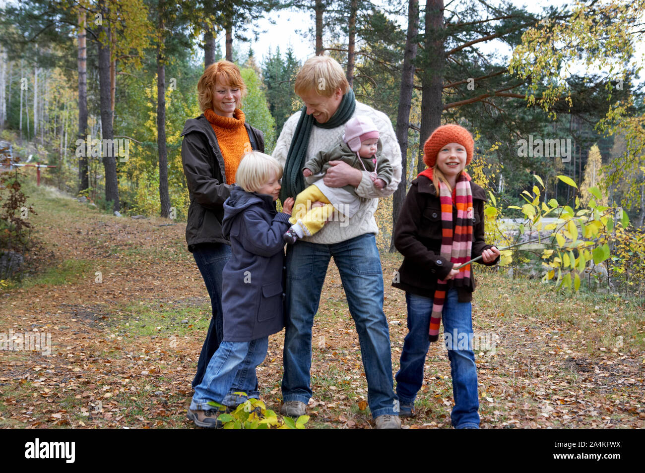 Family in forest Stock Photo