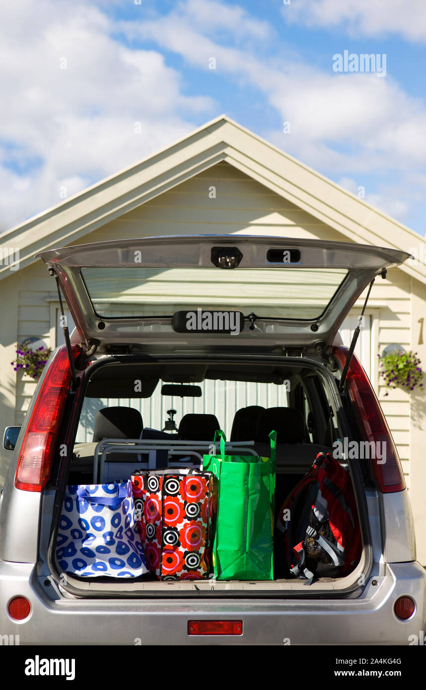 Packed van for family trip. Luggage for summer holiday trip. Stock Photo