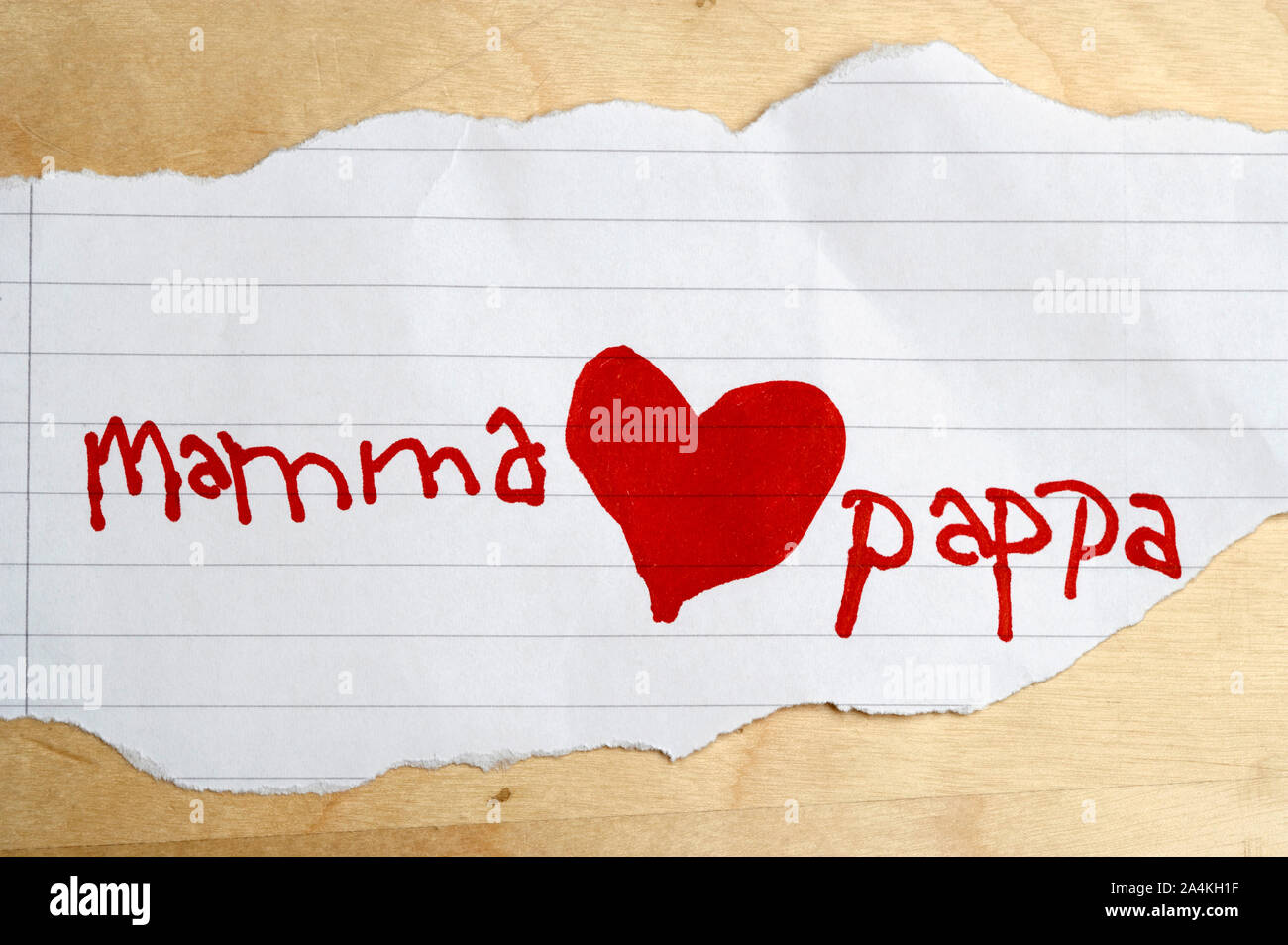 Piece of paper where it ´s written to mom and dad decorated with a red ...