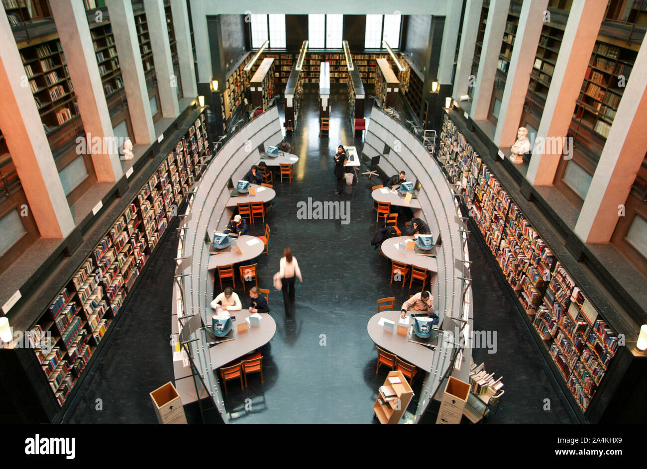 People in a library Stock Photo - Alamy