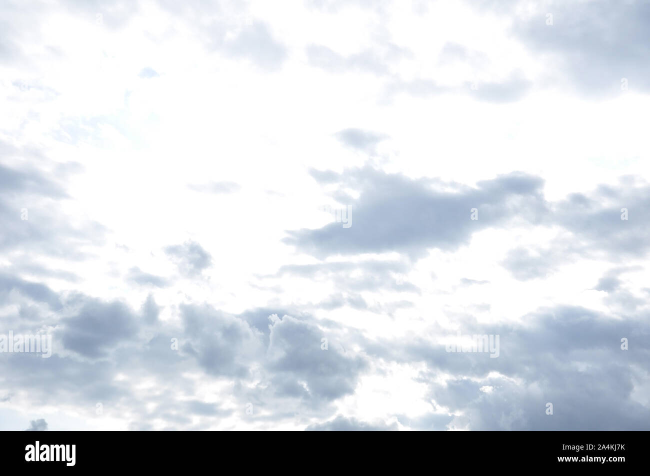 white fluffy clouds in the blue sky Stock Photo