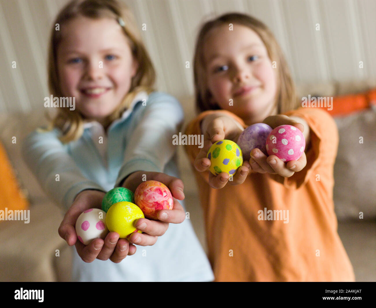 Girls decorating Easter eggs Stock Photo Alamy