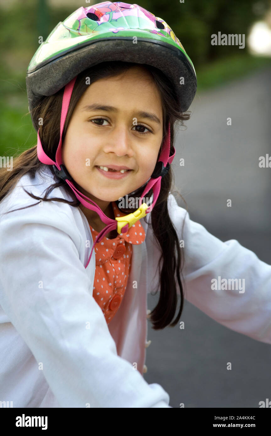 Girl wearing helmet Stock Photo Alamy
