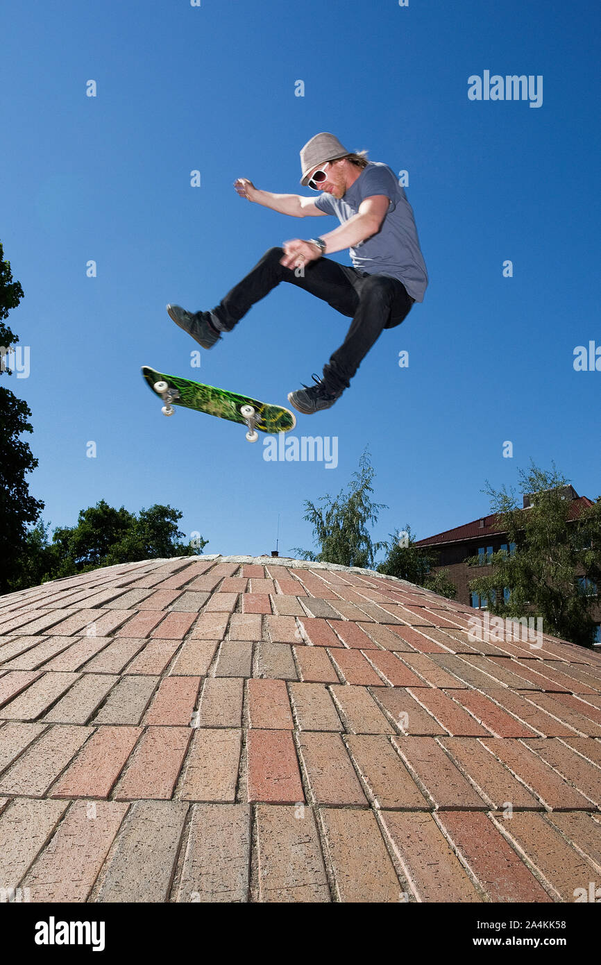 Man Skateboarding On Ramp Stock Photo