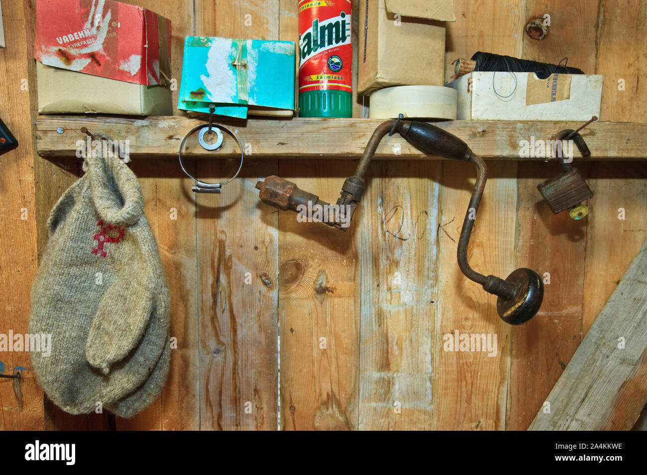 Objects on shelf in a shed Stock Photo