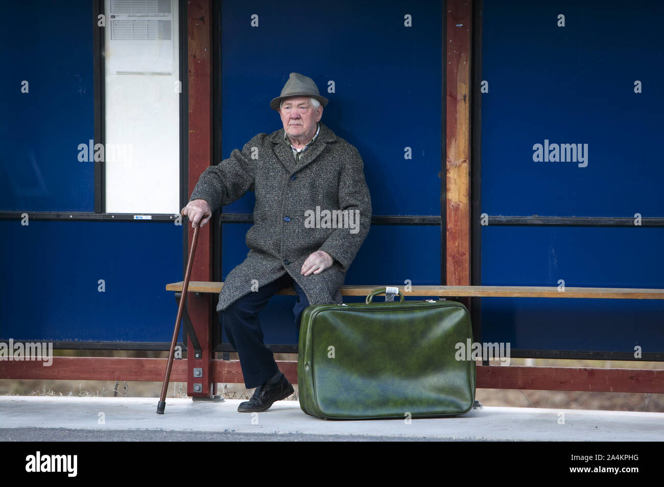 [Image: old-man-waiting-on-a-bus-stop-old-age-pa...A4KPHG.jpg]