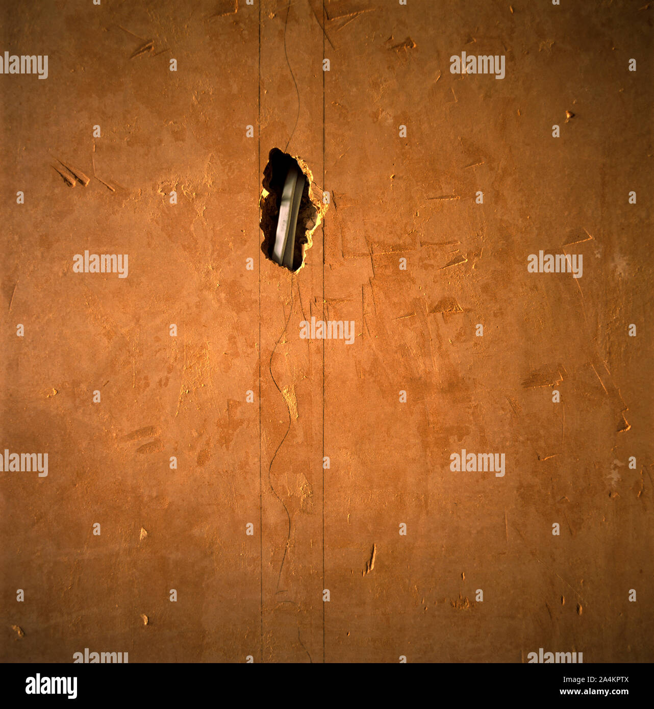 Hole in the wall Stock Photo Alamy