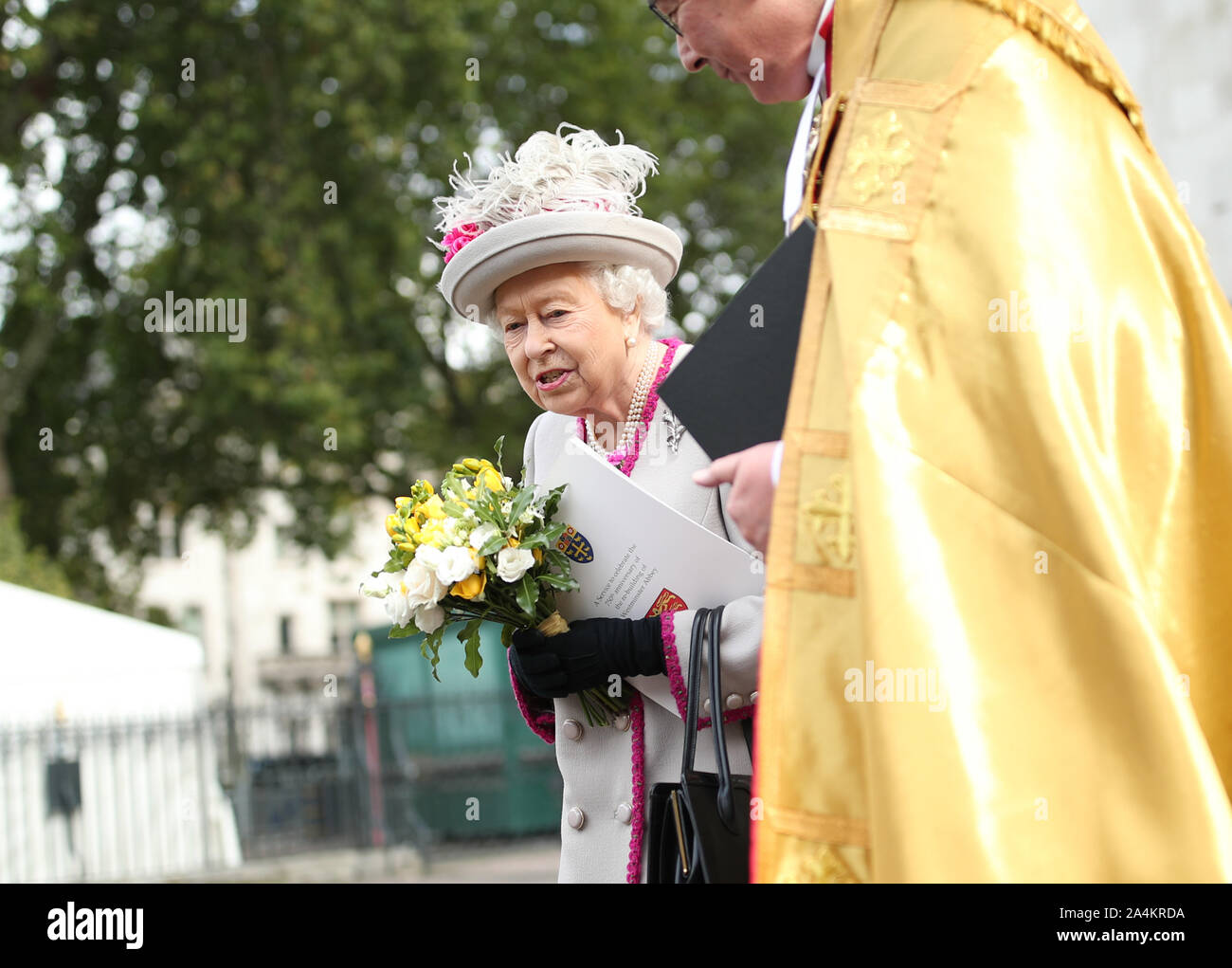 Queen Elizabeth II, accompanied by the Duchess of Cornwall, at the end ...