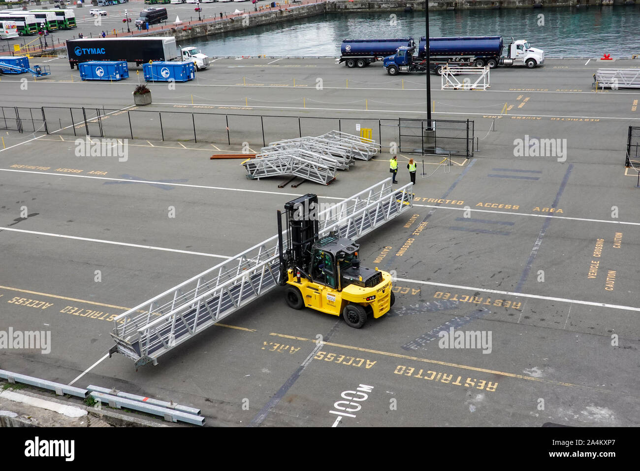 Victoria/Canada-9/14/19: A Hyundai forklift moving dock ramps at a working ship dock in Victoria, Canada. Stock Photo