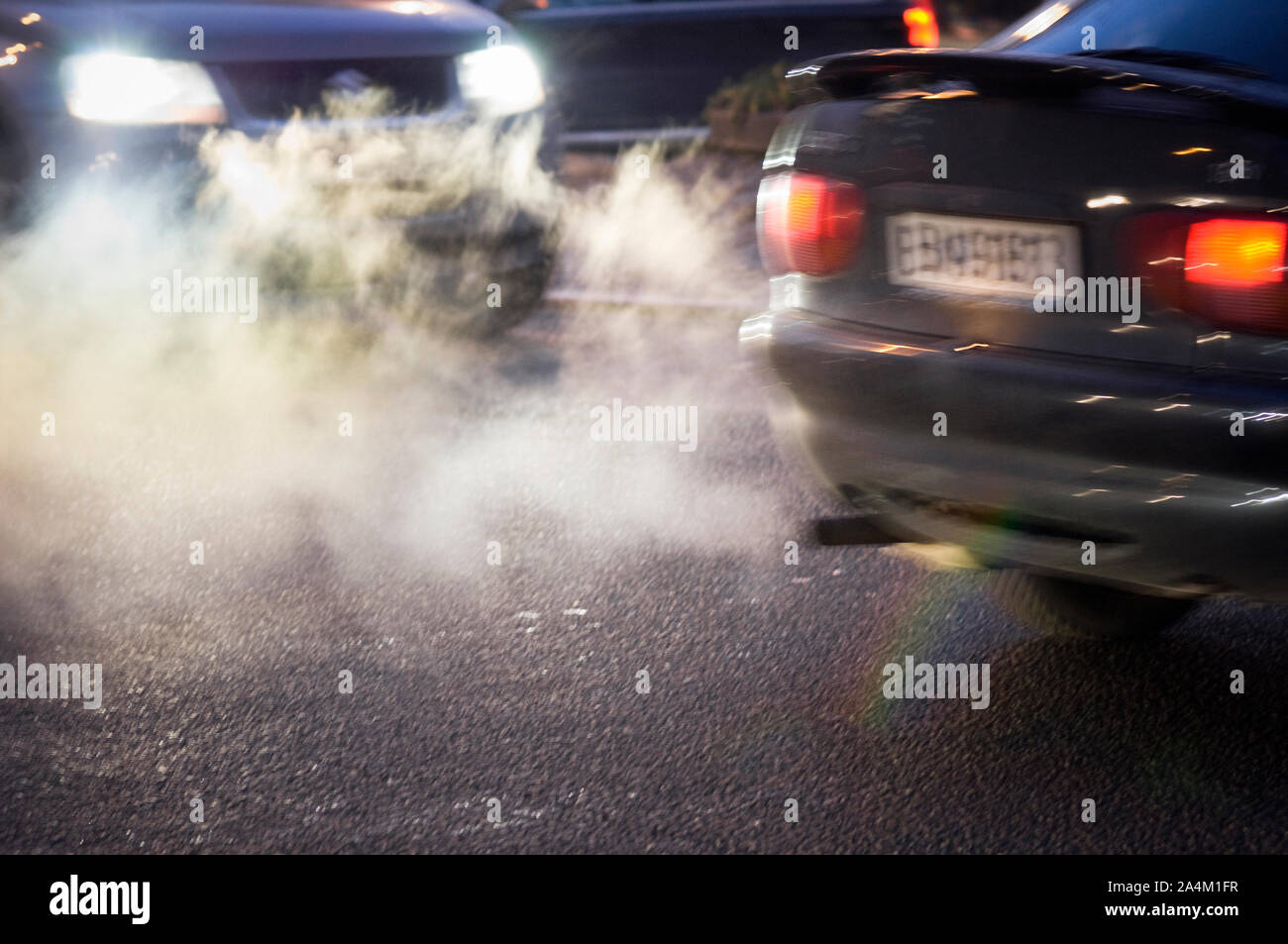 Exhaust - fumes from cars Stock Photo - Alamy