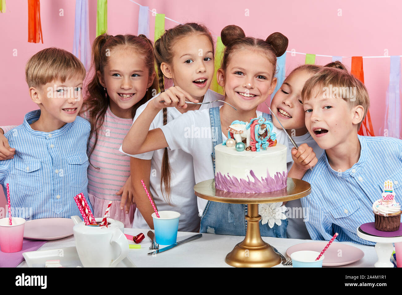 Close Up Of Birthday Cake Being Cut Into Slices Stock Photo - Download  Image Now - Birthday Cake, Cutting, Cake - iStock