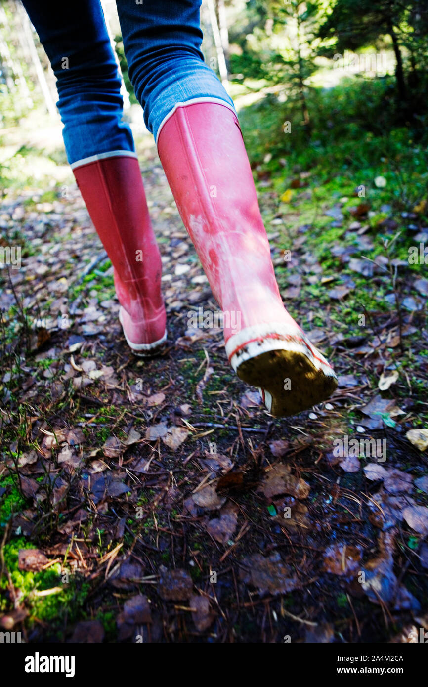 Woman with rubber boots Stock Photo - Alamy
