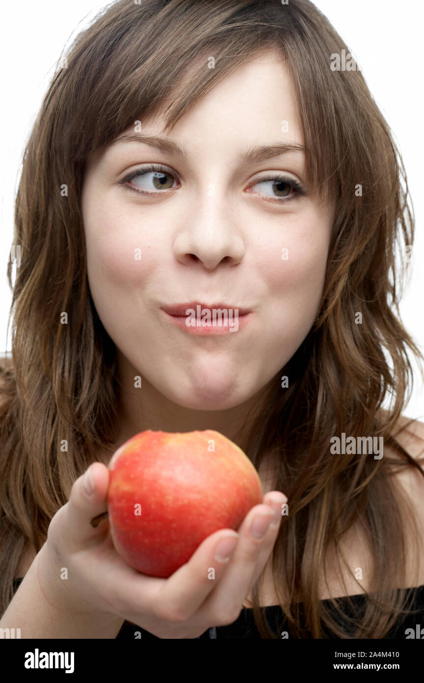 Girl eating an apple Stock Photo