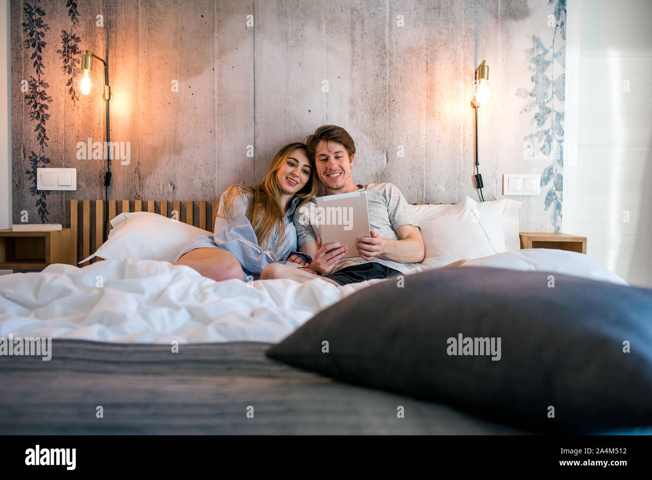 Lovely Couple Lying Down In Stock Photos Lovely Couple