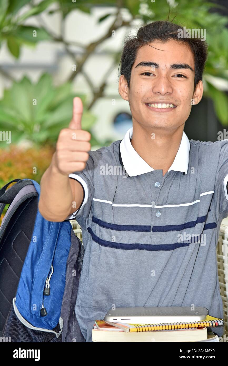 Student With Thumbs Up Stock Photo - Alamy