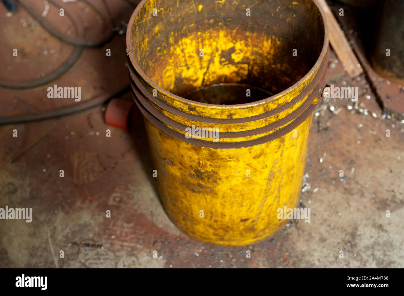 Dirty buckets hi-res stock photography and images - Alamy