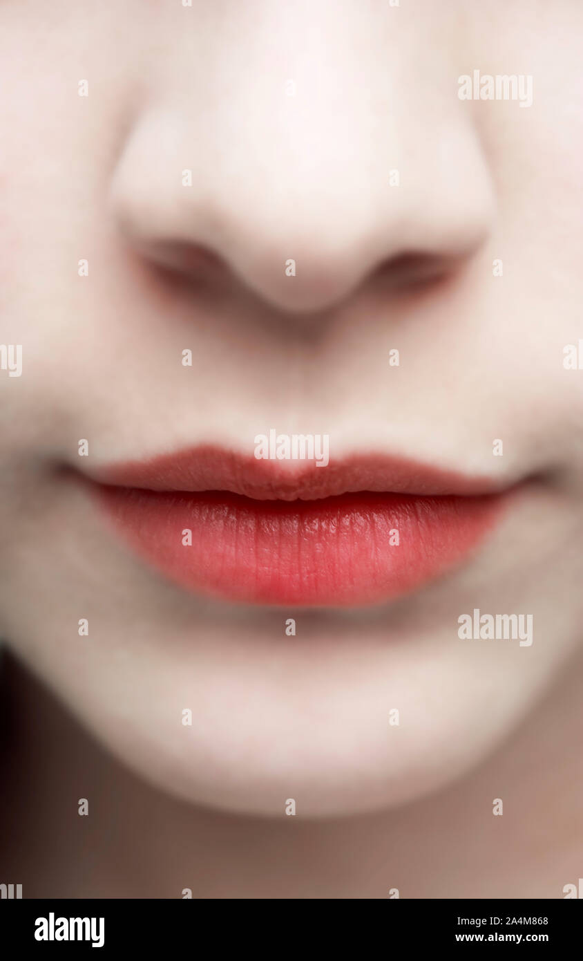 Girl's mouth with lipstick Stock Photo