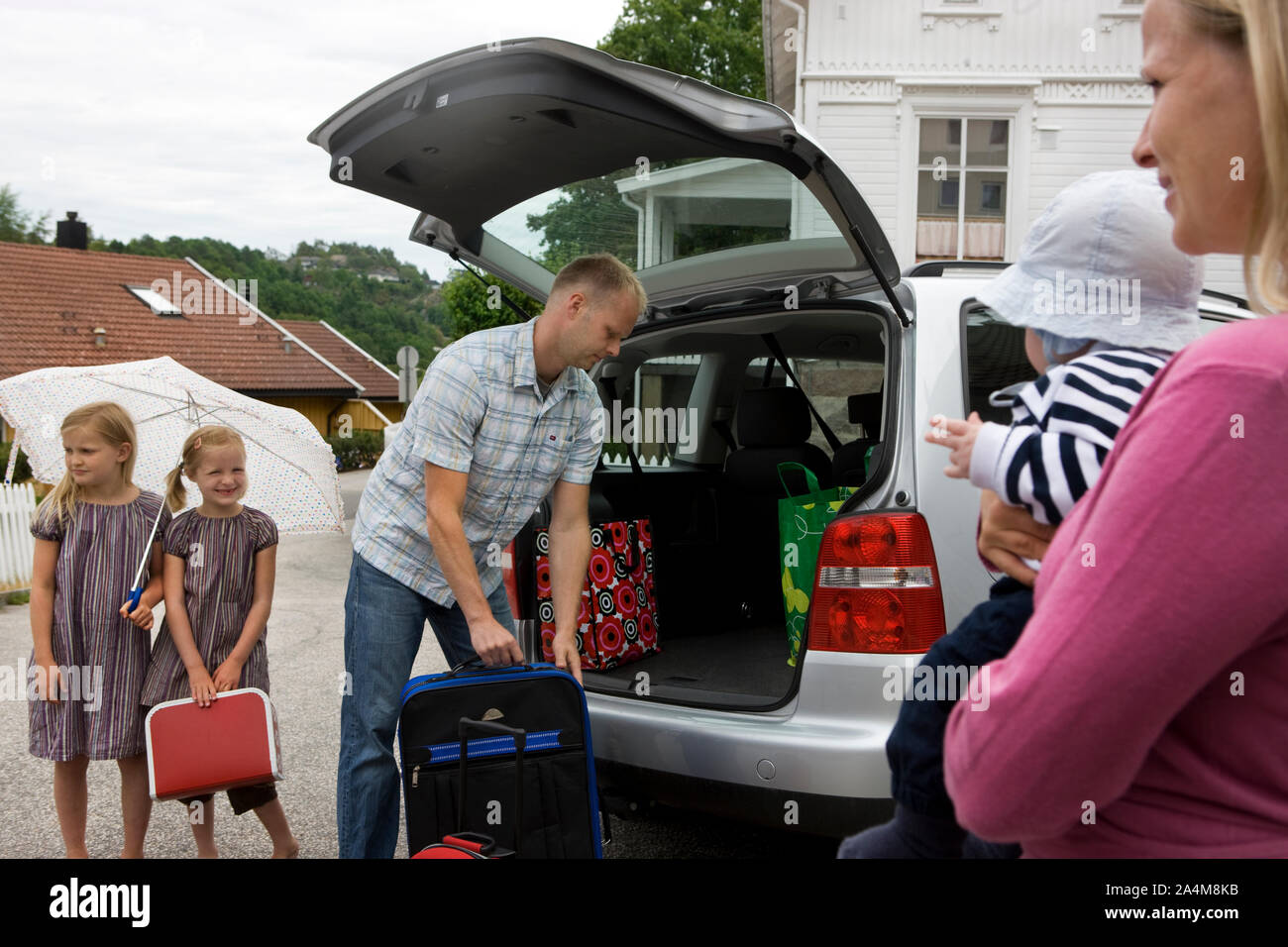Family packing car Stock Photo