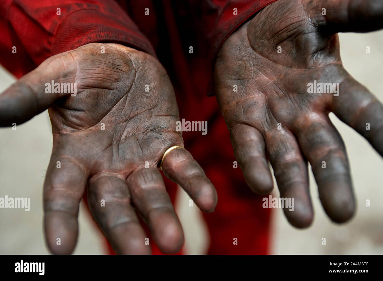 Oil on hands. Dirty work. Stock Photo