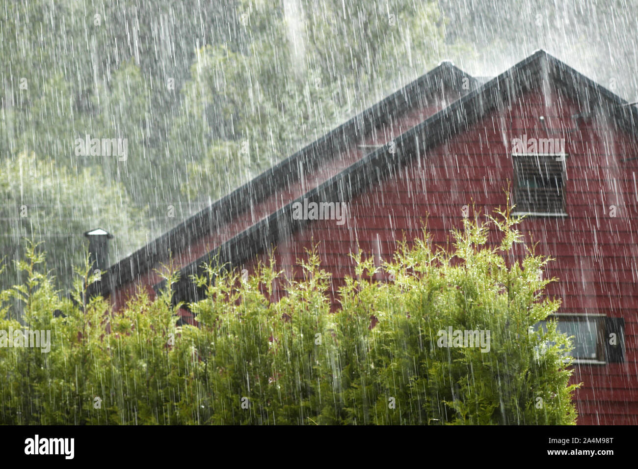 Wooden houses in rain Stock Photo