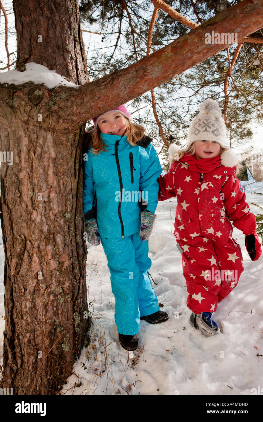 Portrait of Girls standing in Snow Stock Photo - Alamy