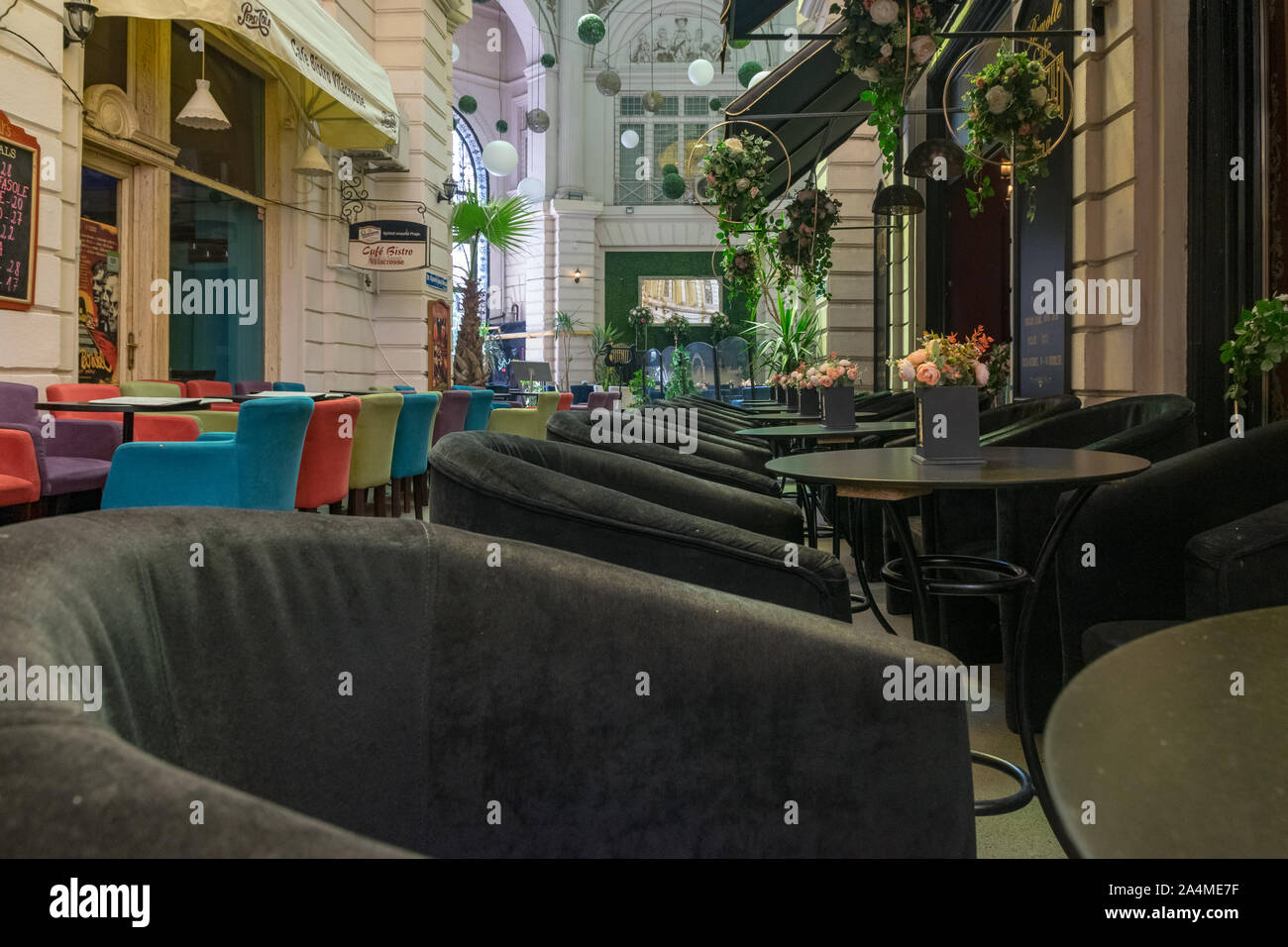 BUCHAREST, ROMANIA - 27 JULY, 2019: Restaurants at the Macca Villacrosse  Passage - a fork-shaped, yellow glass covered arcaded street in central  Bucha Stock Photo - Alamy