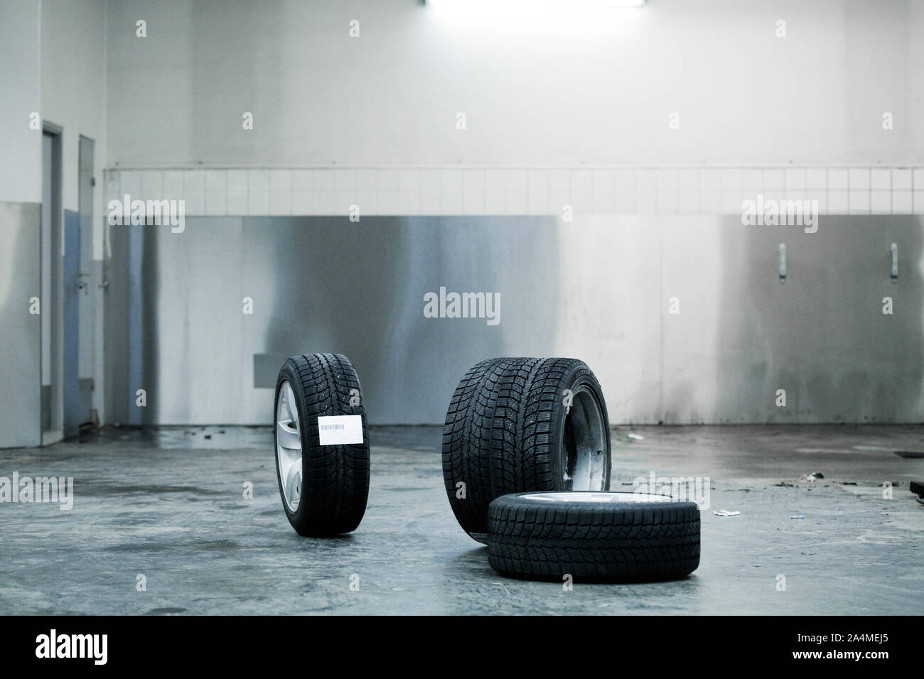 Car tyres in garage Stock Photo Alamy