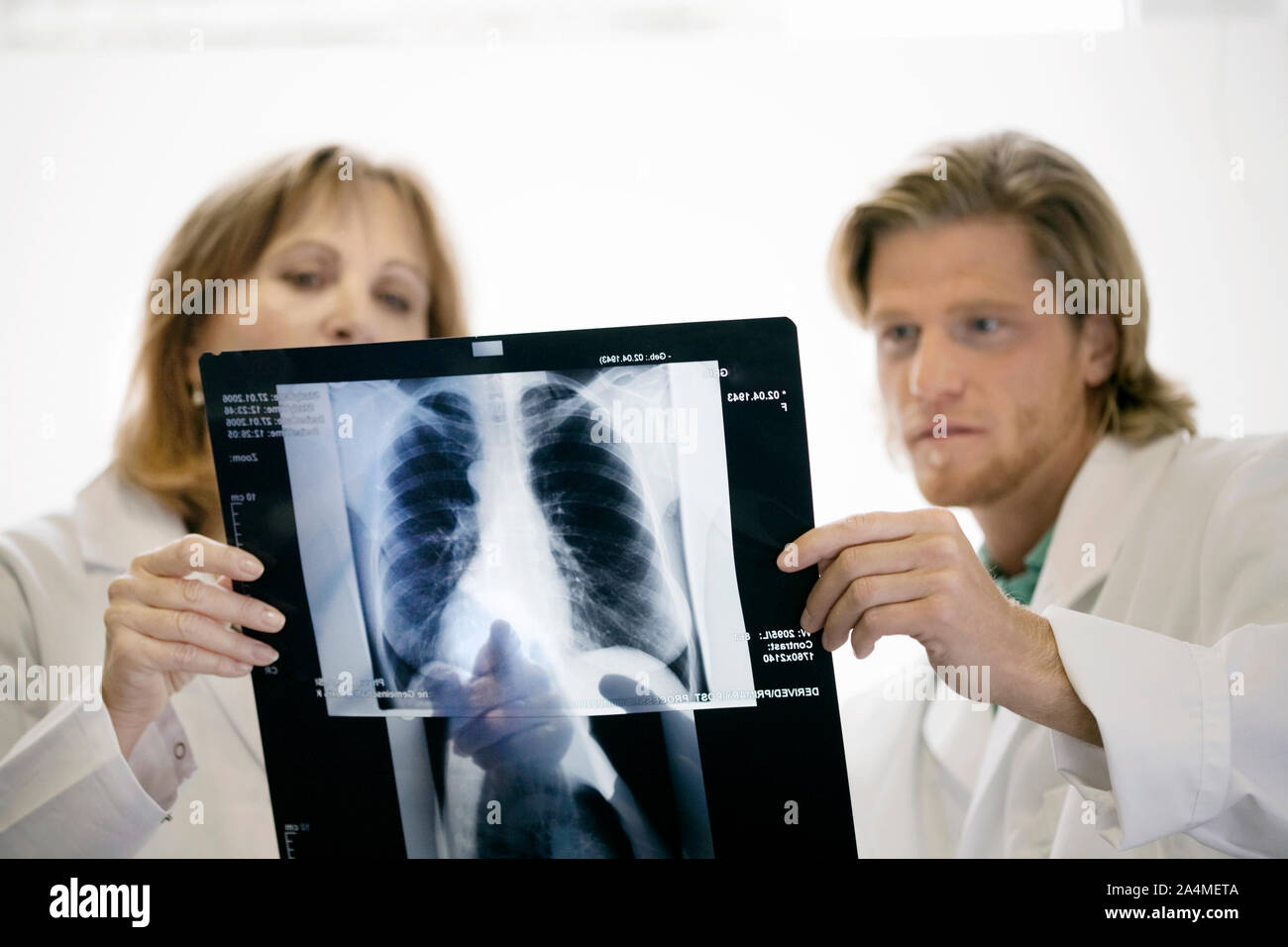 Doctors studying x-ray Stock Photo