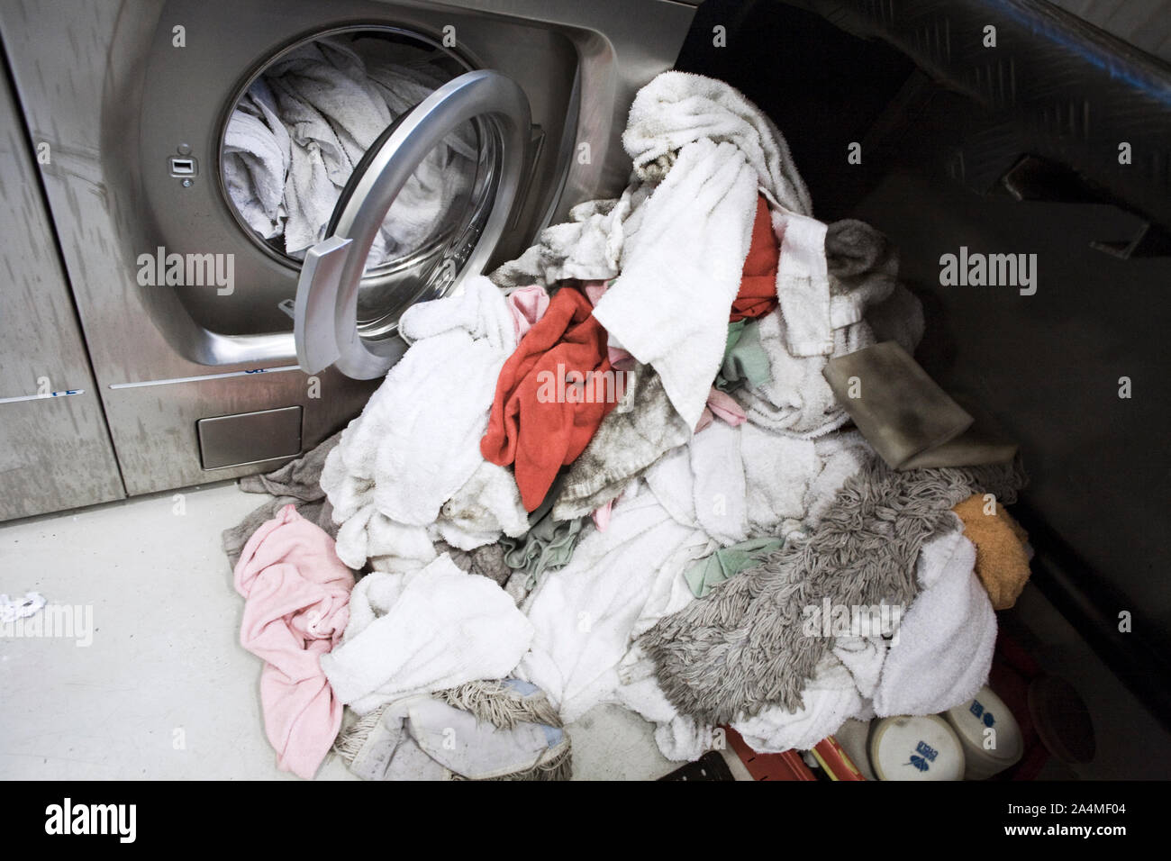 Dirty clothes and washing machine Stock Photo Alamy
