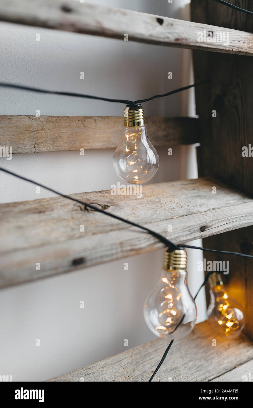 Light bulbs and wooden shelf Stock Photo Alamy