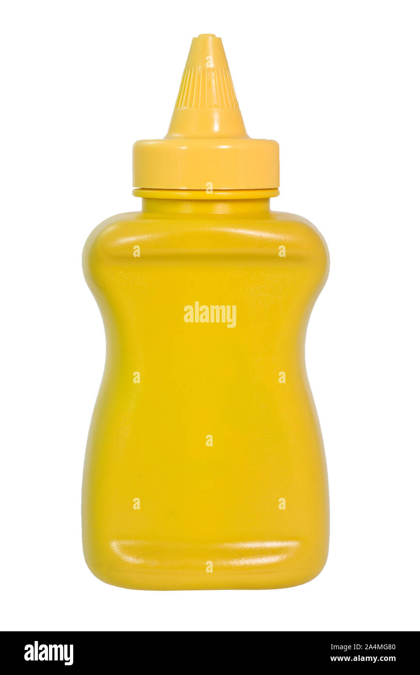 Yellow mustard squeeze bottle container with no label. Isolated. White background. Vertical. Stock Photo
