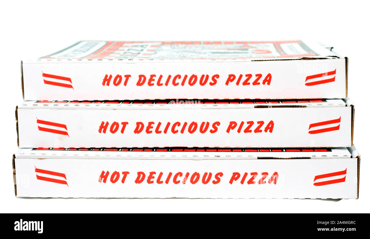 Stack of red and white pizza boxes. White background. Horizontal Stock