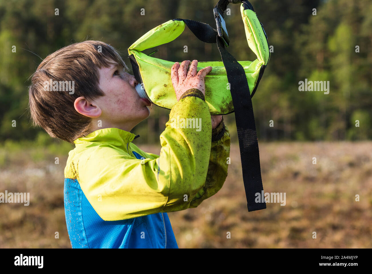 Boy drinking water Stock Photo