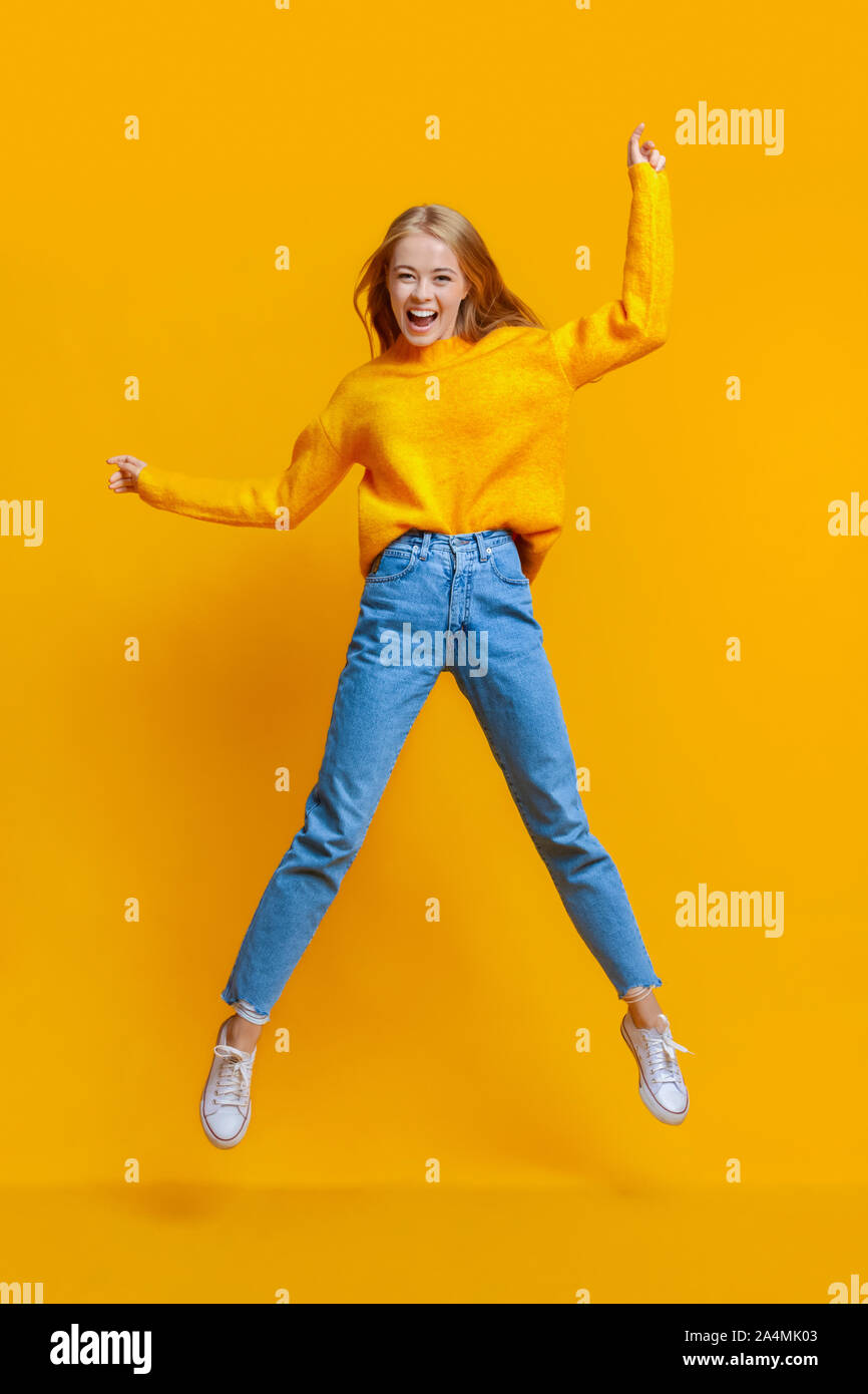 Teen girl jumping in air hi-res stock photography and images - Alamy