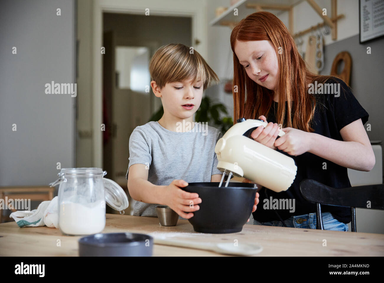 Children using electric mixer Stock Photo Alamy