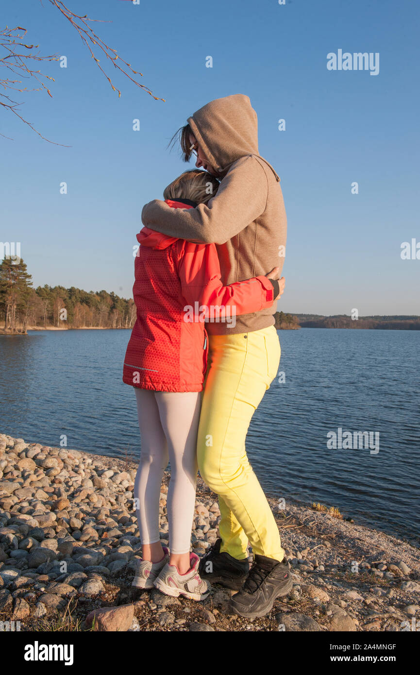 Couple daughter lake hi-res stock photography and images - Alamy