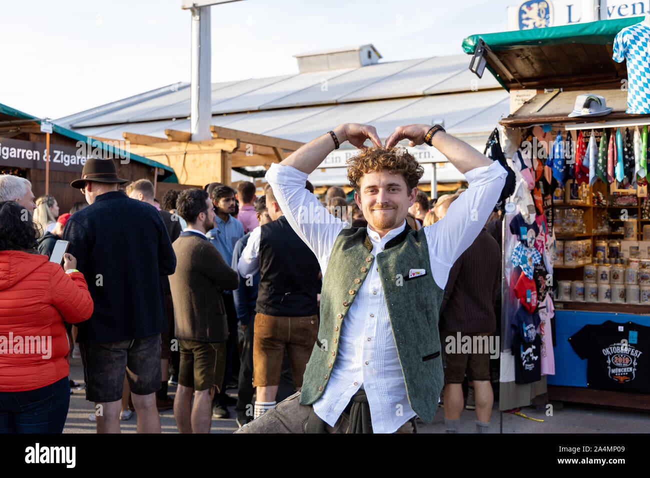 Munich, Germany - 2019, September 28: visitors, beertents and candy shops on the oktoberfest in munich Stock Photo