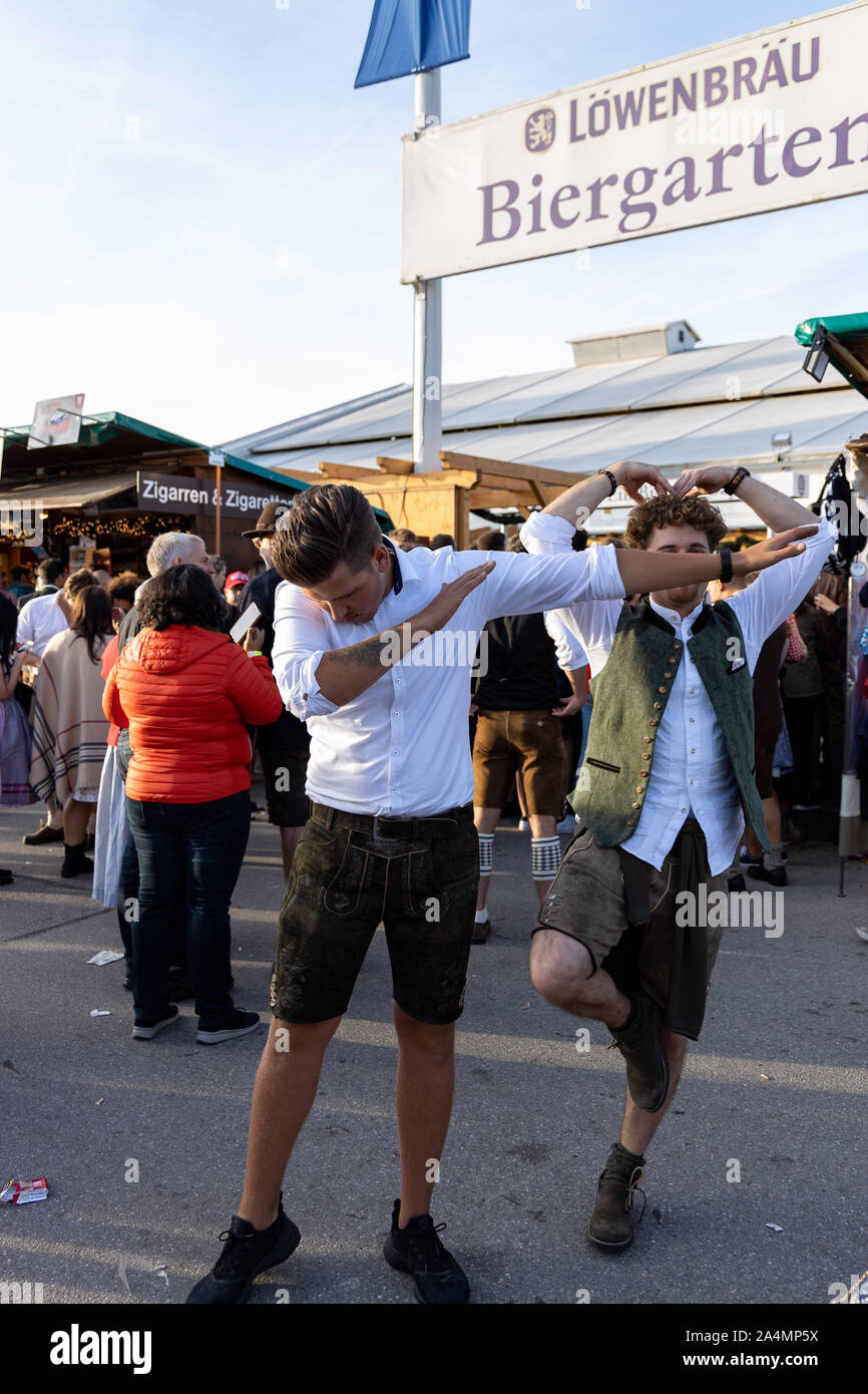 Munich, Germany - 2019, September 28: visitors, beertents and candy shops on the oktoberfest in munich Stock Photo