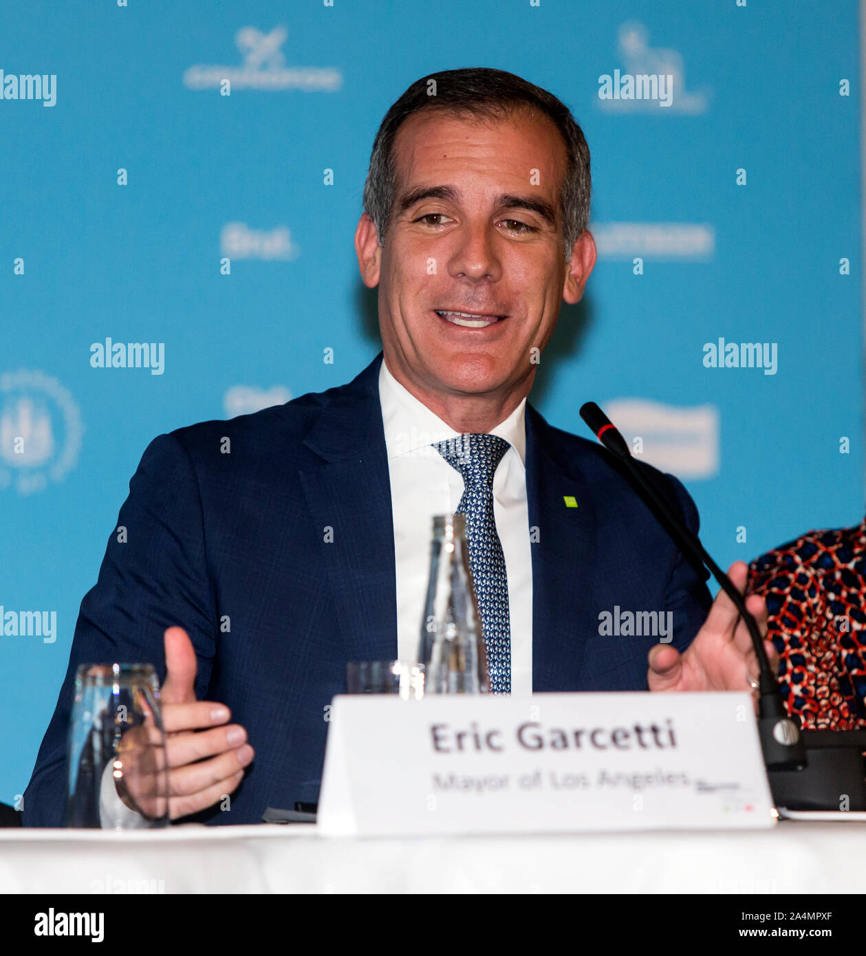 COPENHAGEN, DENMARK – OCTOBER 09, 2019: Mayor of Los Angeles and the coming Chair for the C40 World Mayors, Eric Garcetti, speaks during the C40 World Mayors Summit opening press conference at Copenhagen City Hall. More than 90 mayors of some of the world’s largest and most influential cities representing some 700 million people meet in Copenhagen from October 9-12 for the C40 World Mayors Summit. The purpose with the summit in Copenhagen is to build a global coalition of leading cities, businesses and citizens that rallies around radical and ambitious climate action. Also youth leaders from t Stock Photo