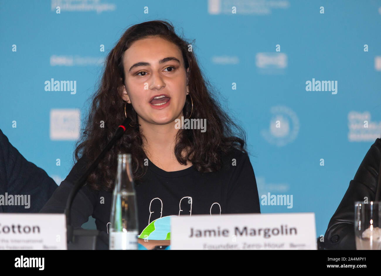 COPENHAGEN, DENMARK – OCTOBER 09, 2019: Jamie Margolin of Seattle, USA, and founder of the Zero-Hours movement speaks during the C40 World Mayors Summit opening press conference at Copenhagen City Hall. More than 90 mayors of some of the world’s largest and most influential cities representing some 700 million people meet in Copenhagen from October 9-12 for the C40 World Mayors Summit. The purpose with the summit in Copenhagen is to build a global coalition of leading cities, businesses and citizens that rallies around radical and ambitious climate action. Also youth leaders from the recent Cl Stock Photo