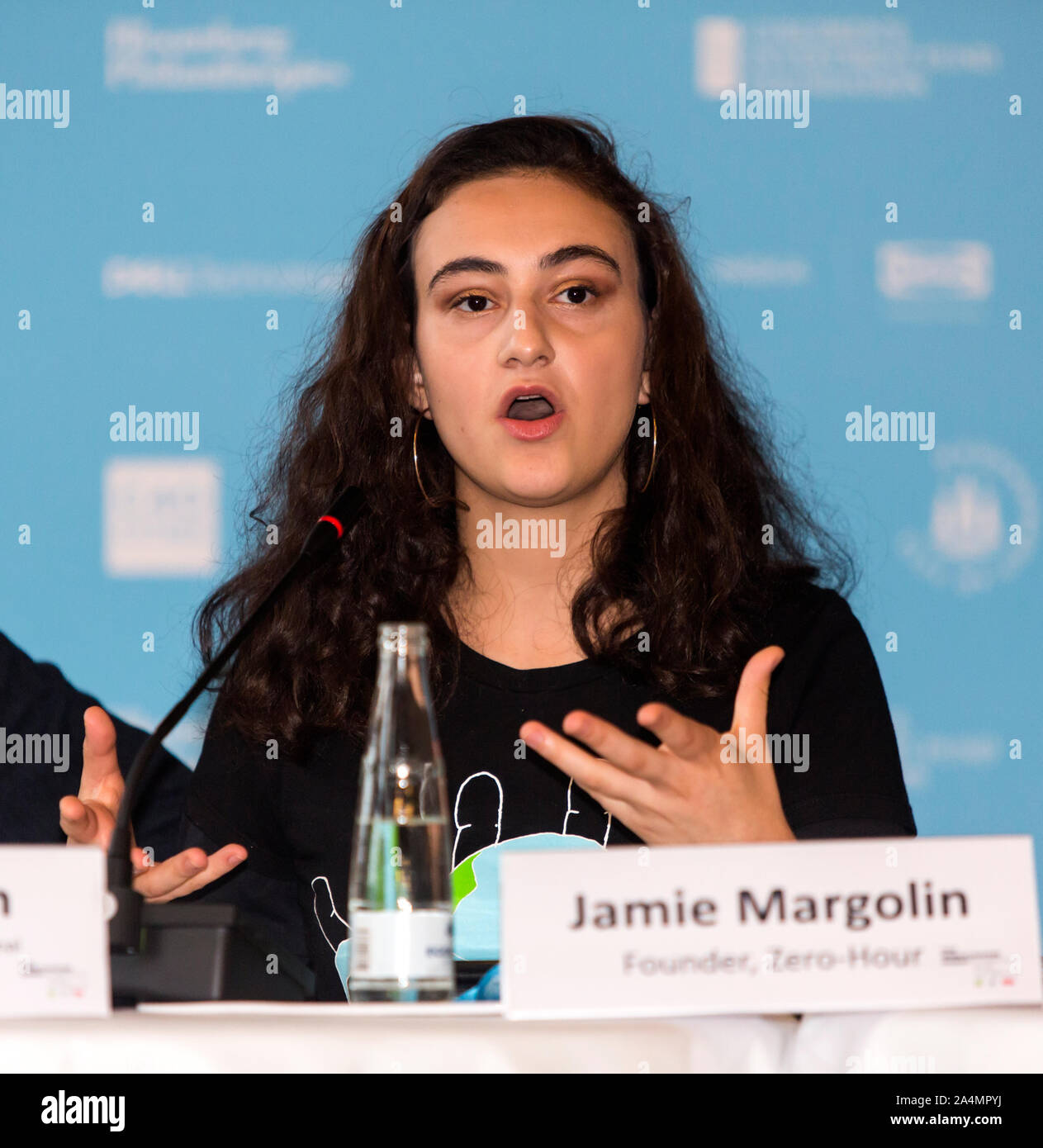COPENHAGEN, DENMARK – OCTOBER 09, 2019: Jamie Margolin of Seattle, USA, and founder of the Zero-Hours movement speaks during the C40 World Mayors Summit opening press conference at Copenhagen City Hall. More than 90 mayors of some of the world’s largest and most influential cities representing some 700 million people meet in Copenhagen from October 9-12 for the C40 World Mayors Summit. The purpose with the summit in Copenhagen is to build a global coalition of leading cities, businesses and citizens that rallies around radical and ambitious climate action. Also youth leaders from the recent Cl Stock Photo