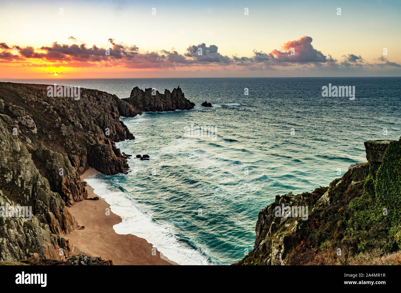 sunrise near porthcurno in cornwall, england Stock Photo
