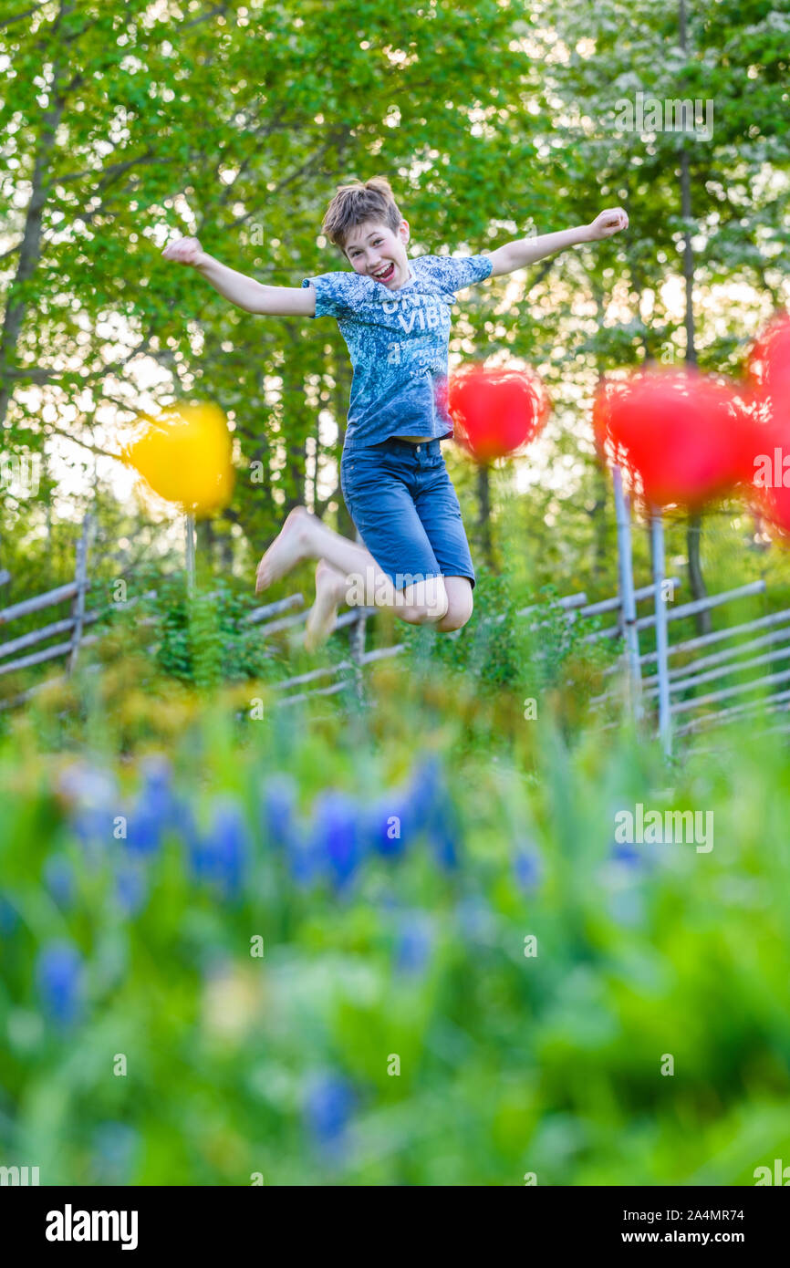 Happy boy jumping Stock Photo