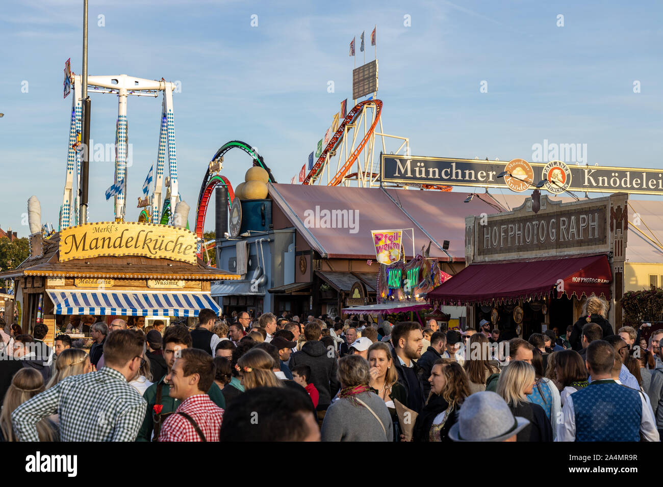 Munich, Germany - 2019 September 29: visitors, beertents and candy shops on the oktoberfest in munich Stock Photo